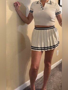 Trendy White Knit Polo Top & Pleated Mini Skirt Set with Black Stripes